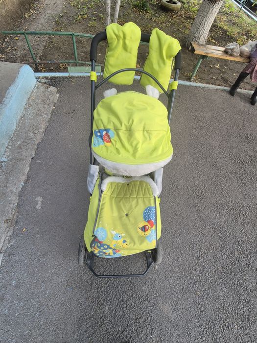 Продам зимнюю коляску-санки