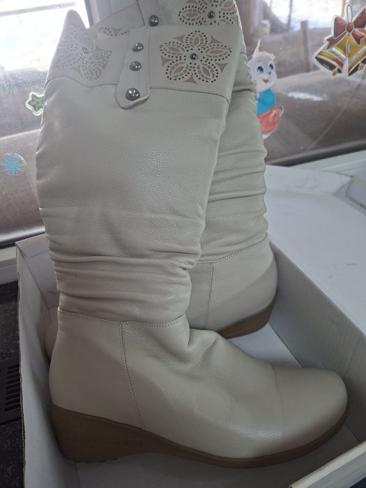 Продам новые зимние сапоги