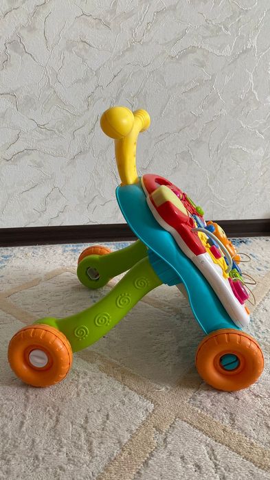 Каталка-ходунок,развивающий