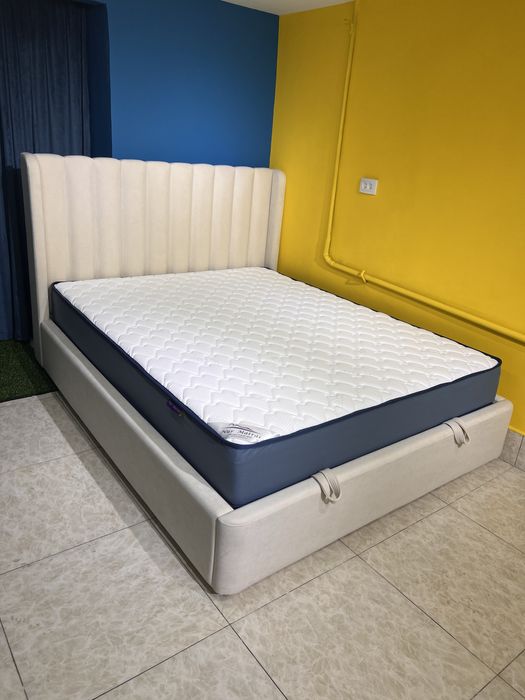 Плюсы кроватей с подъемными механизмами