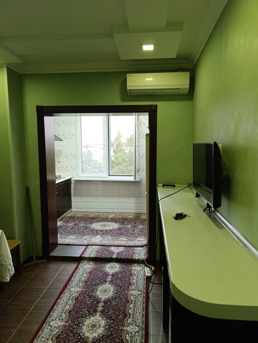 Юнусабад -19 2 х комн.передел.в трёх с обстановкой.