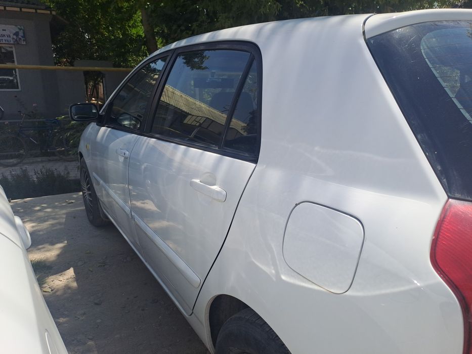 Тайота королла 2002