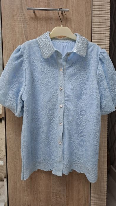 Киілмеген көк түсті кофточка