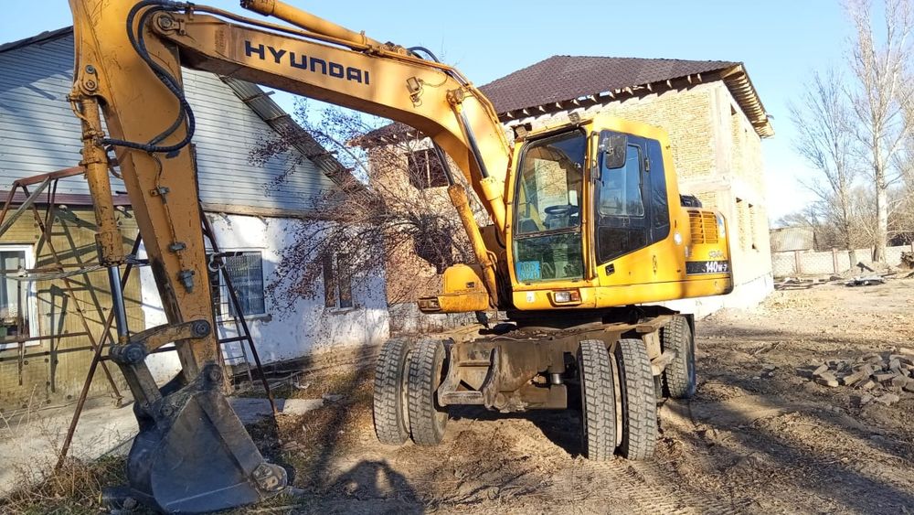 Экскаватр Хундай 140w