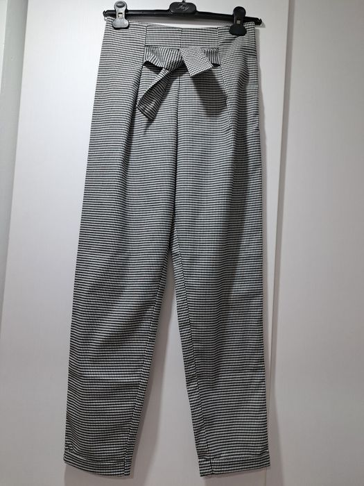 Pantaloni pana la glezna