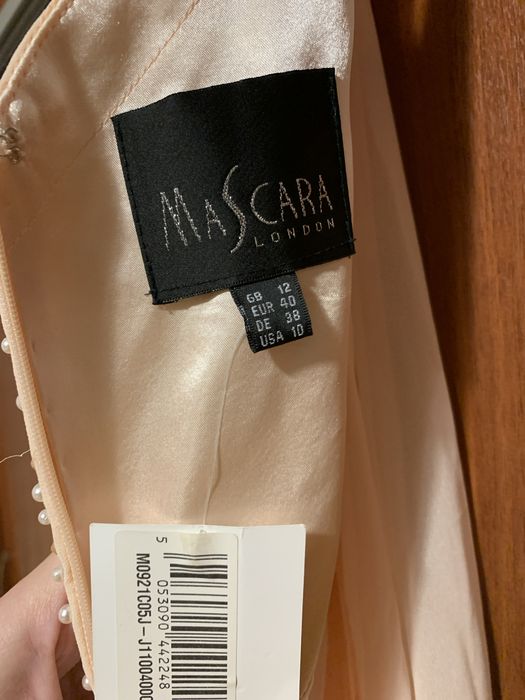 Вечернее платье персикового цвета