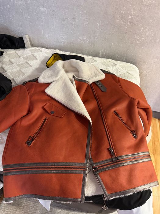 Продам одежду куртки пуховик и т.д