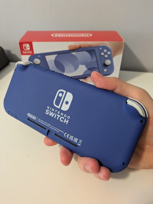 Nintendo switch lite ca nou + card Kingston 128gb