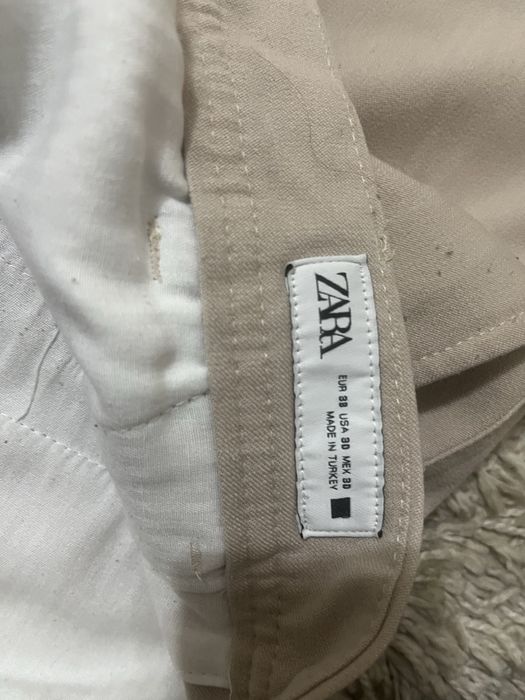Бежевые брюки Zara