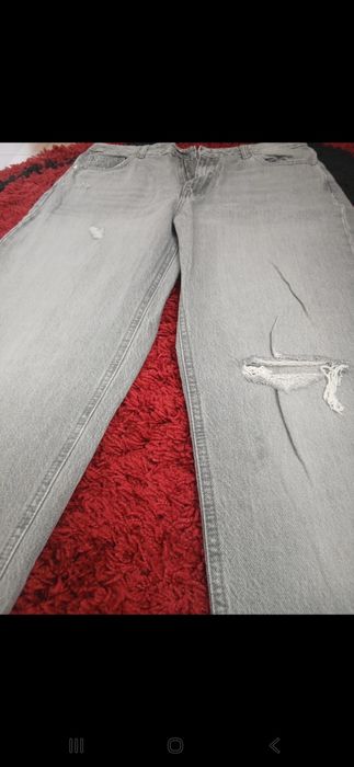 Blugi rupți,stare foarte bună