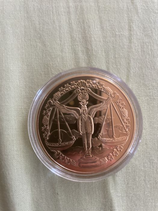 Монети със зодии