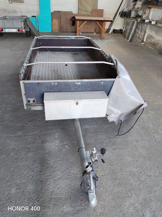 Remorca 750 kg adusa recent