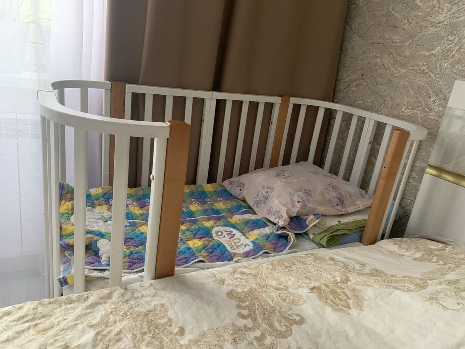 Продам детскую кровать с маятником