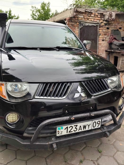 Мицубиси л200 пикап