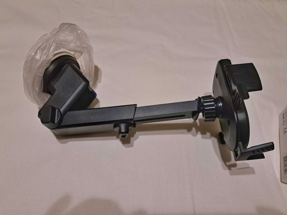 Телескопична стойка за телефон.