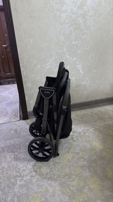 Детская коляска.-чемодан Kidilo