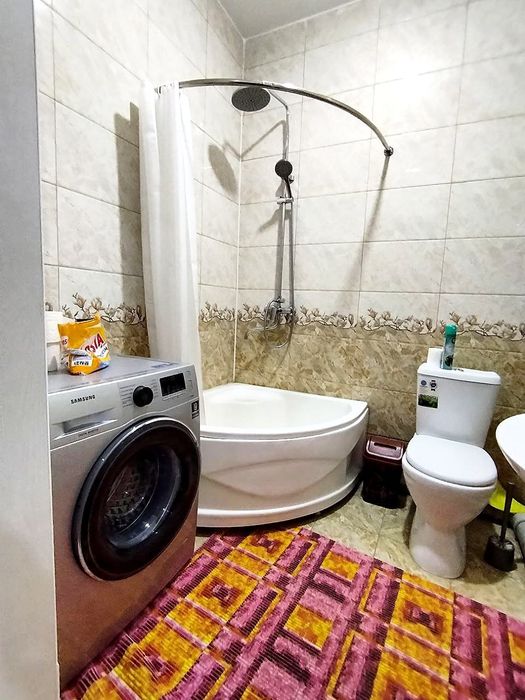 Квартира в 16 этажном новостройке в центре Нукуса