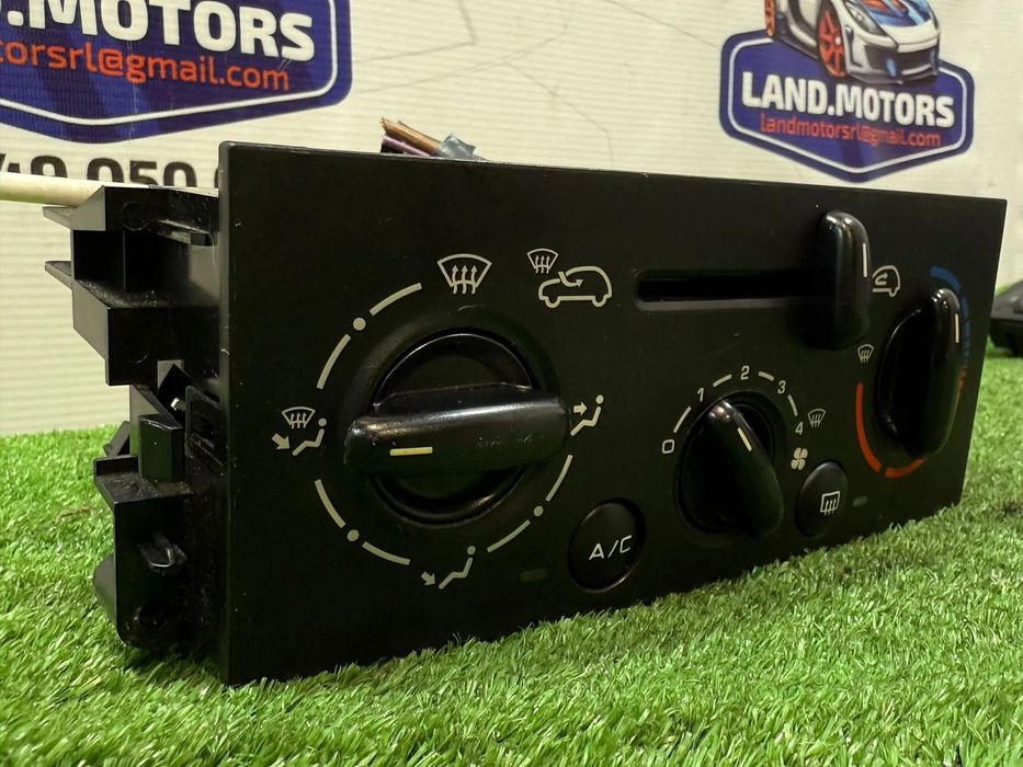 PANOU CENTRAL COMANDA CLIMA PEUGEOT 207 1.4 BENZINA 2007 COD OEM 69910002 6451TK 2006-2014