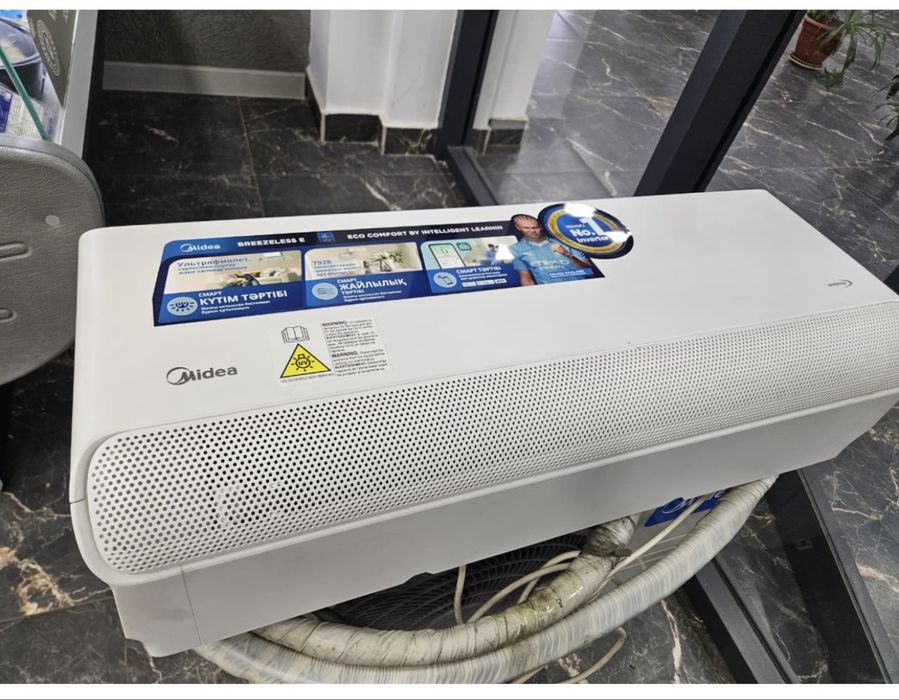 Кондицирнер Midea