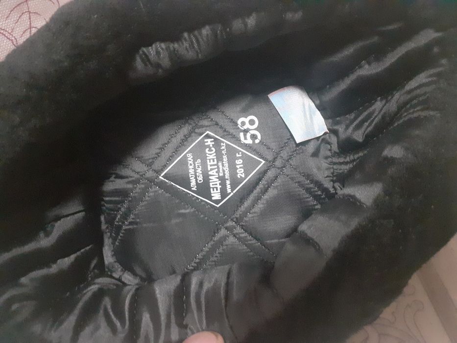 Продам шапку ушанку 58 размер новый