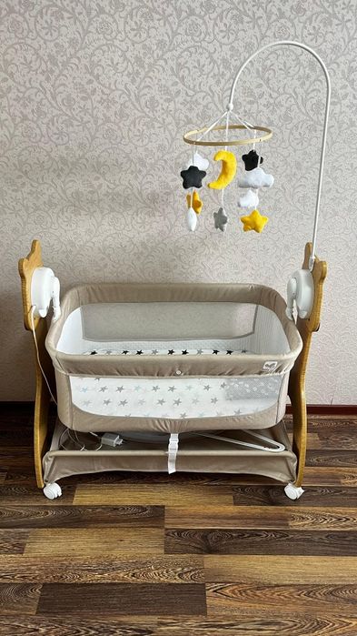 Электронная детская кроватка