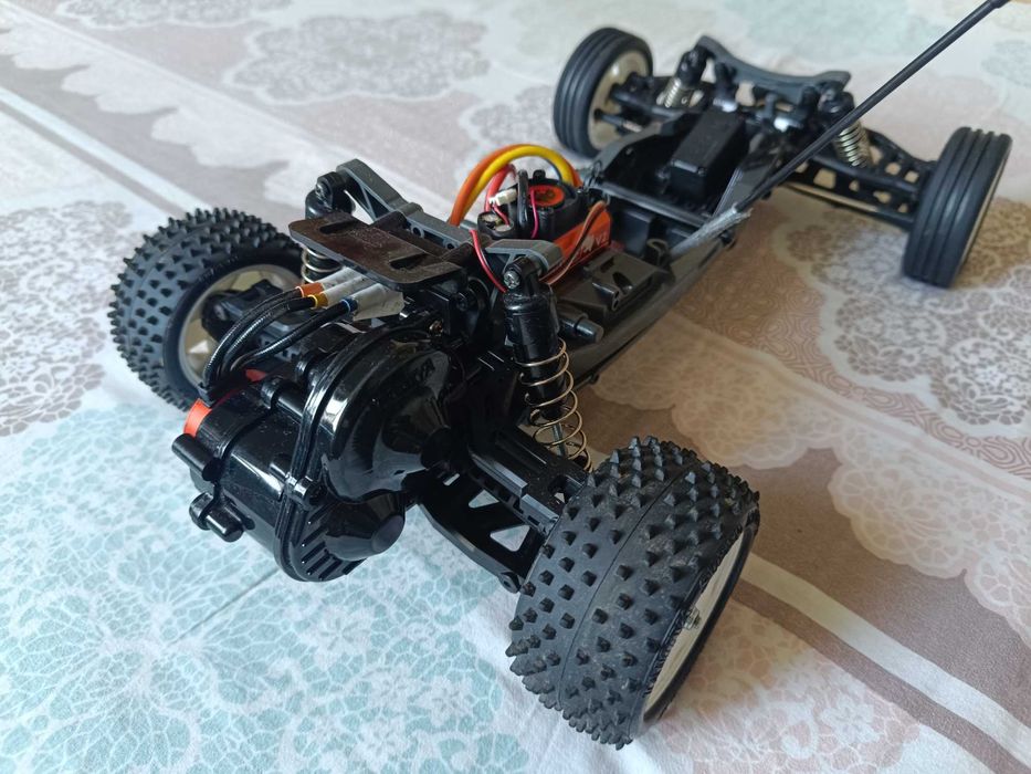 Radiomodel asamblat Tamiya #58587 DT-03 „Neo fighter buggy” (fără electronice)