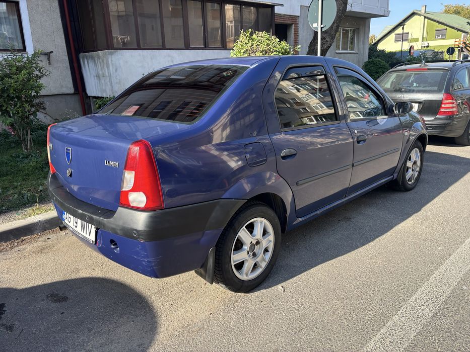 Logan 1.4 bezina cu gaz.