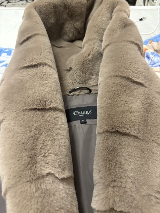 Продаю женский пуховик