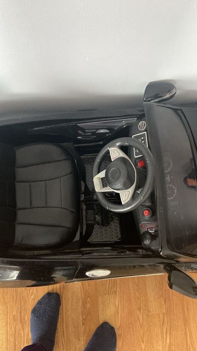 Детский электромобиль черный