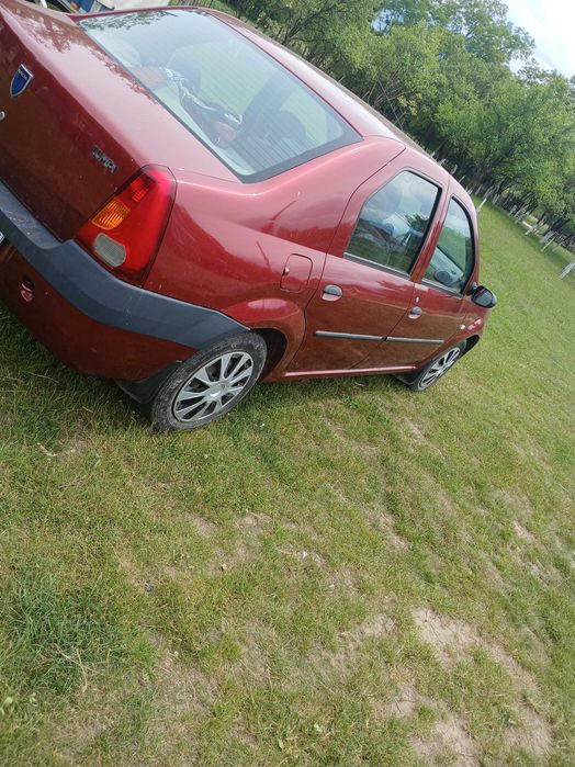 Vând sau schimb dacia logan