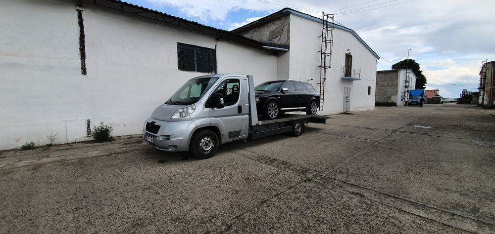 Tractari auto Transport non-stop Platforma slep remorcari accidente