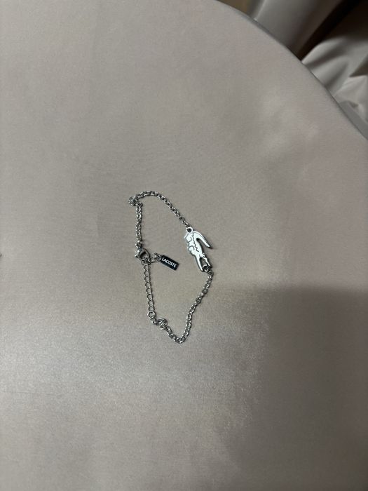 Комплект гривни на Lacoste