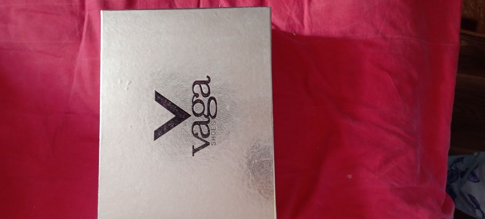 Новые туфли на высоких коблуках