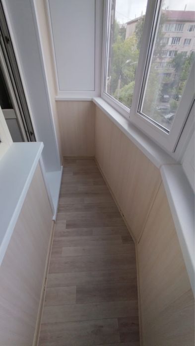 Балконы с обшивкой