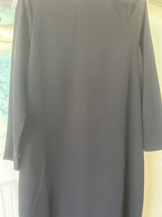 Рокля с мотив на гърба