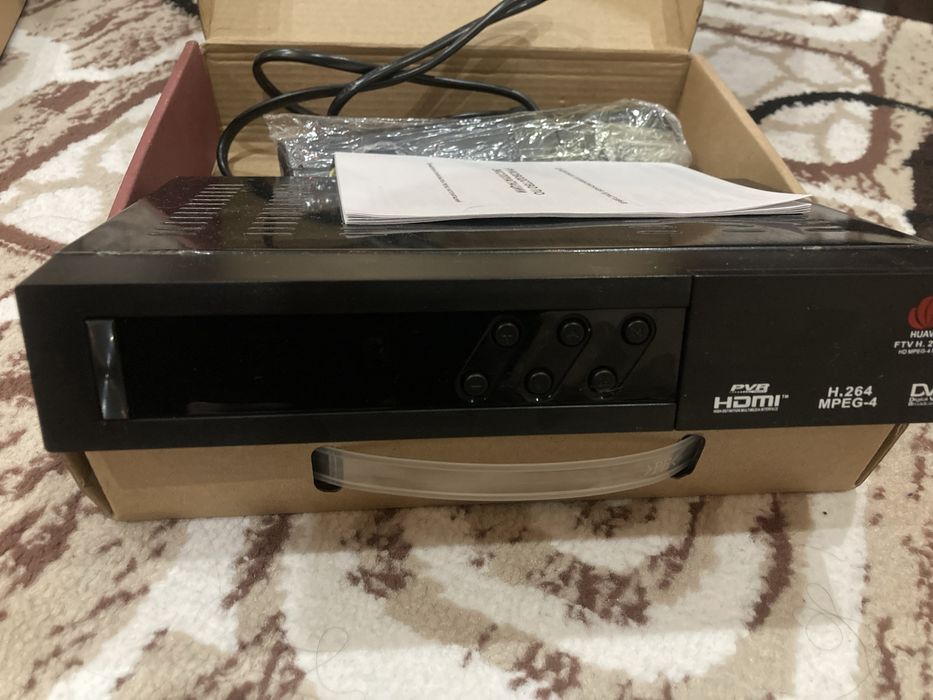 Продается тюнер новый почти не пользовались