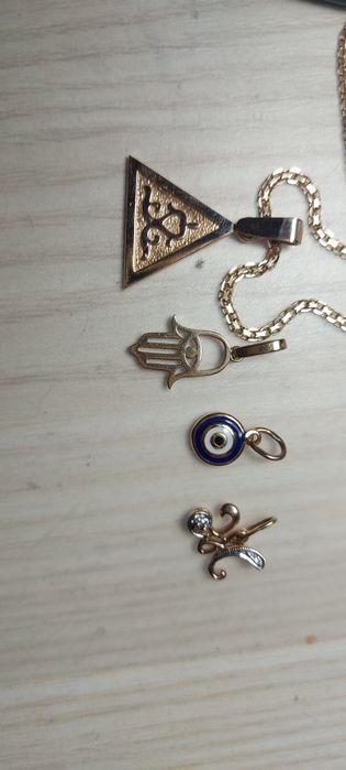 Золотой кулон 585 пр тумар