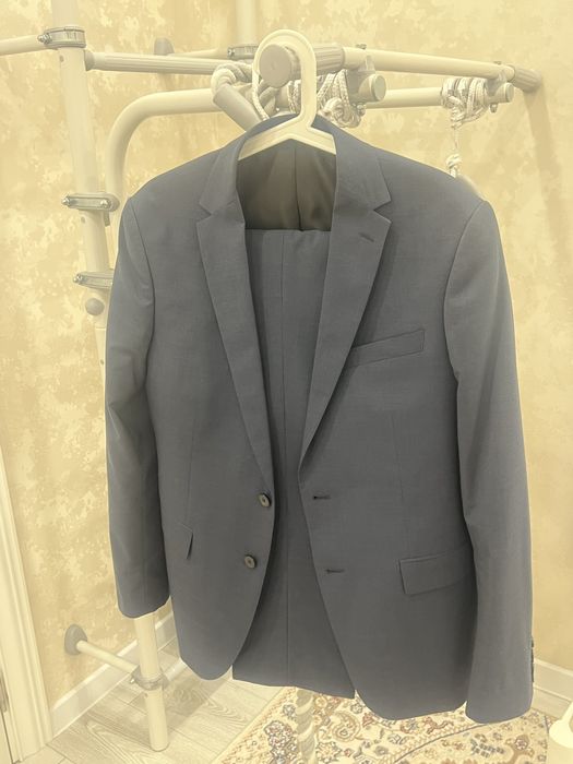 Продам новый костюм