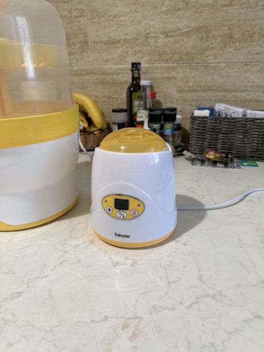 Sterilizator biberoane si incalzitor biberoane.