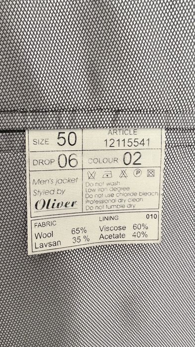 Продам костюм серого цвета