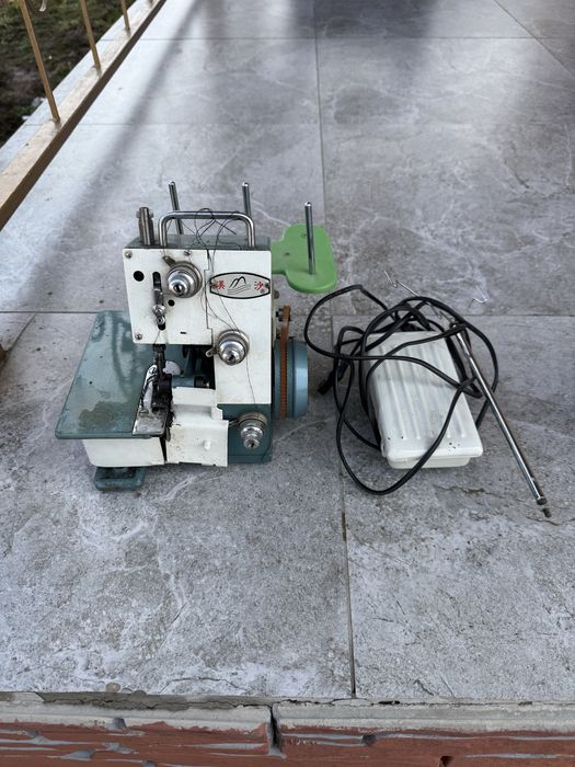 Оверлок швейная машина