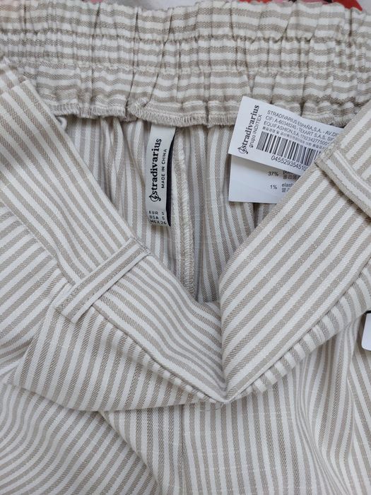 Pantaloni dungi Stradivarius