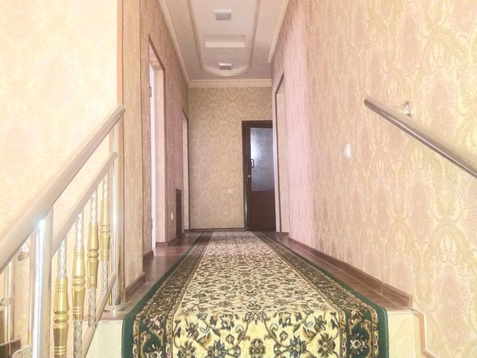 Мирзо Улугбекский район Чингельди угловой дом 2-этажный 6-сотых 8-комн