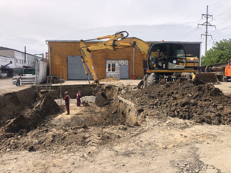 Услуги колесного экскаватора