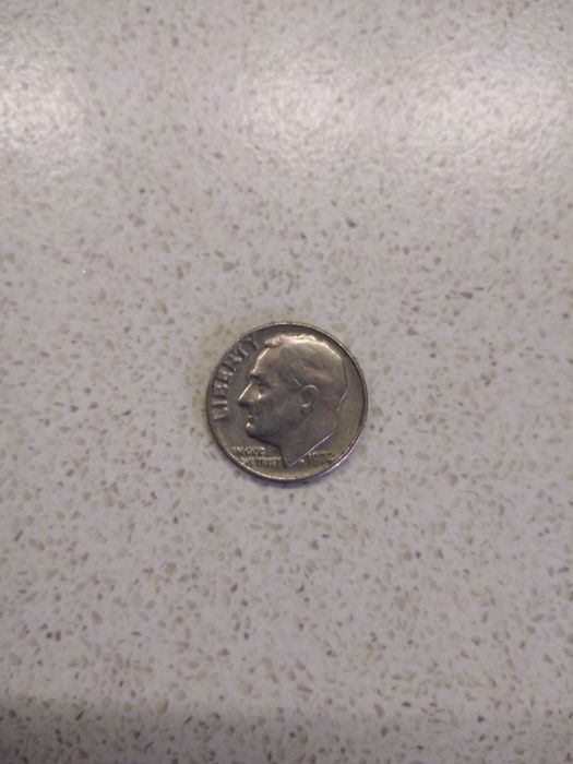 Американска колекционерска монета и стари сребърни български монети