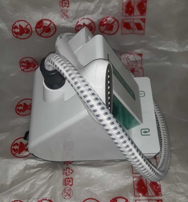 Отпариватель утюг вертикальный OMEGA.Новый практически.