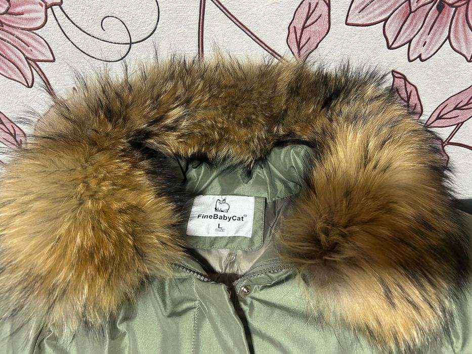 Продам женский пуховик