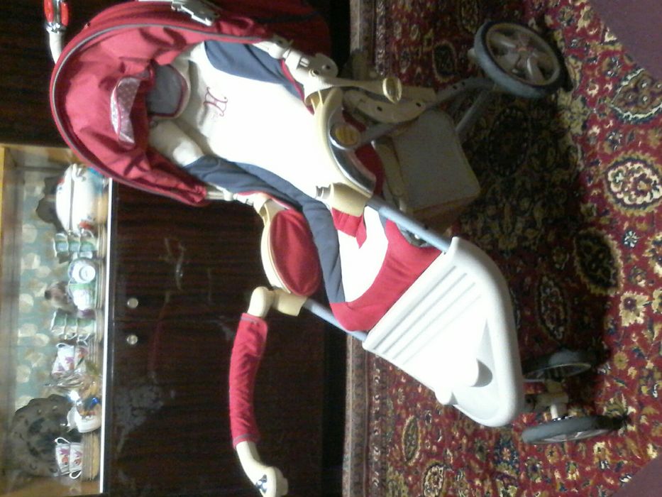 Детская коляска красная