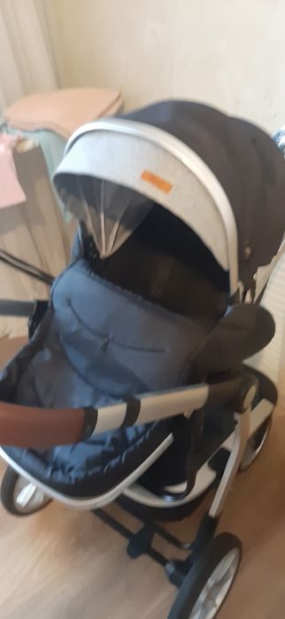 Продам коляску и стульчик