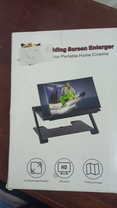 Продается  подставка для телефона с лупой